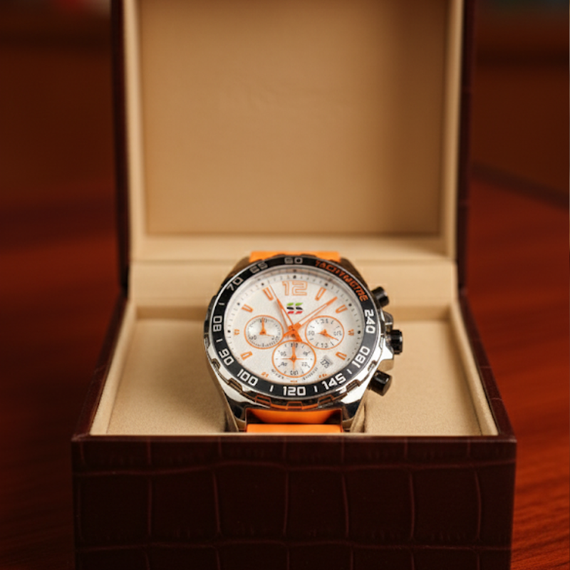 Apex Dusk men's quartz watch with luminous hands and date display, silver case, white dial, and orange silicone strap, presented in a brown leather watch box.