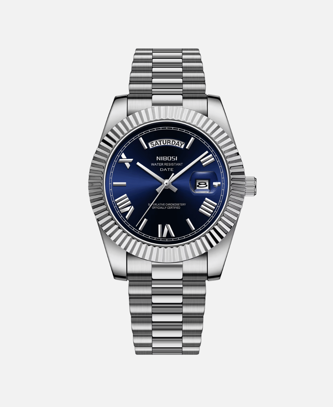 Dateday Classic Watch with silver stainless steel case, blue dial, and silver metal strap. Features day and date display, Roman numerals, and fluted bezel.