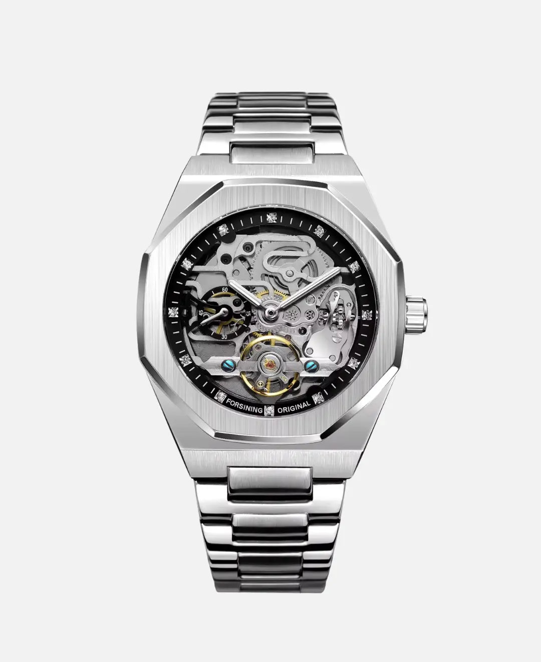 Front view of a silver mechanical skeleton watch with visible gears and mechanisms, presented on a plain light gray background. The watch features a silver metal strap and case.
