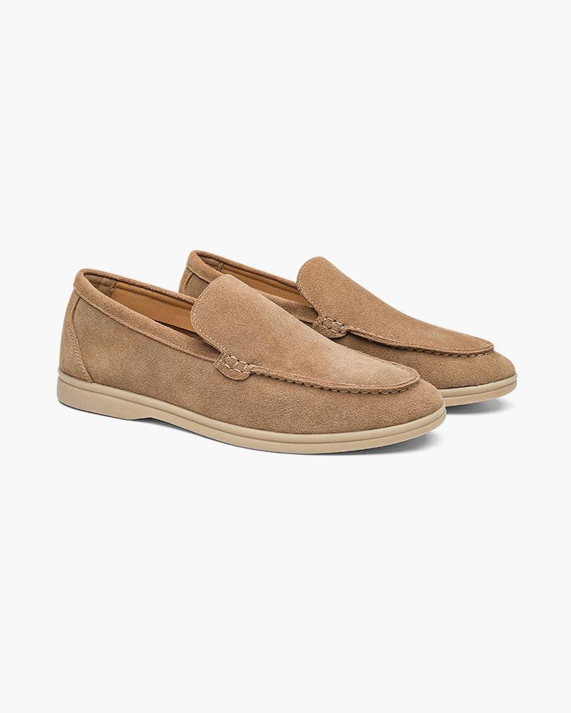 Heritage Luxe men's caramel suede loafers with classic stitching, shown as a pair from an angle on a white background. Comfortable and stylish casual footwear.