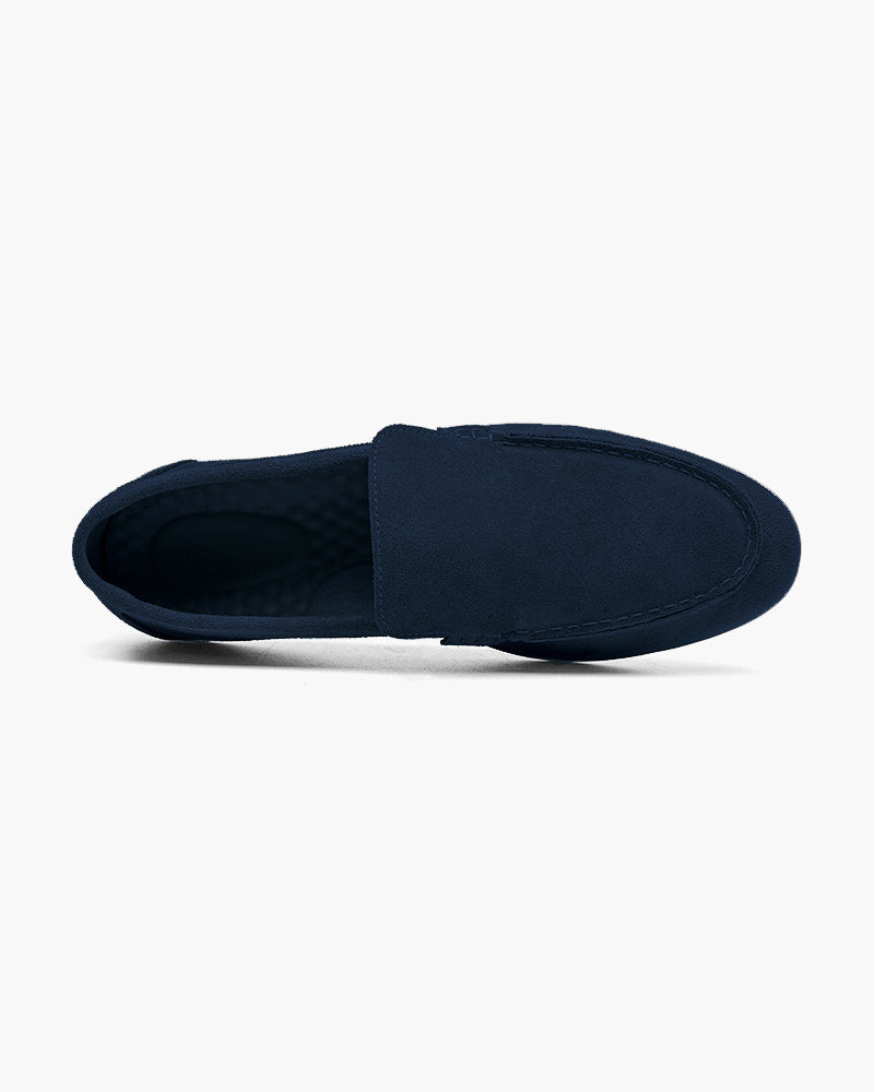 Heritage Luxe men's navy blue suede loafer with classic stitching, shown from a top-down perspective on a white background.