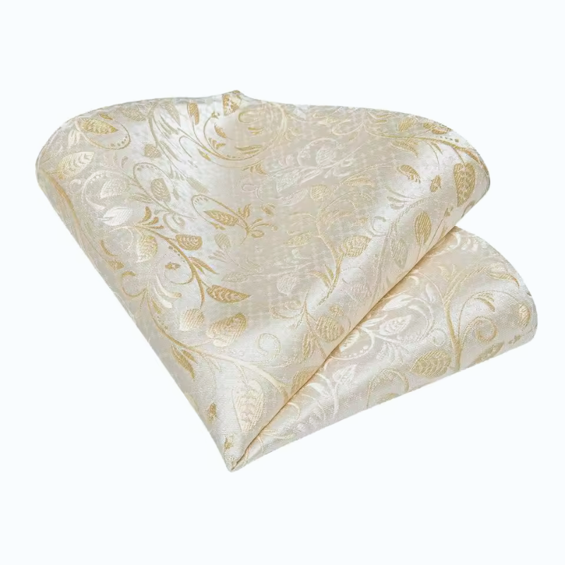 Folded fabric with gold floral pattern on a white background