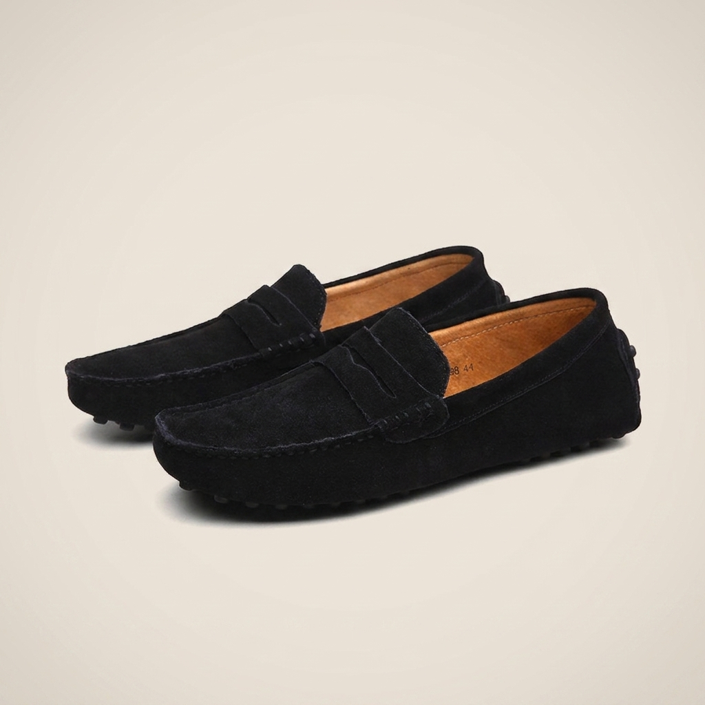 Black nubuck leather round toe breathable slip-on loafer shown front view with flat heel and visible stitching details