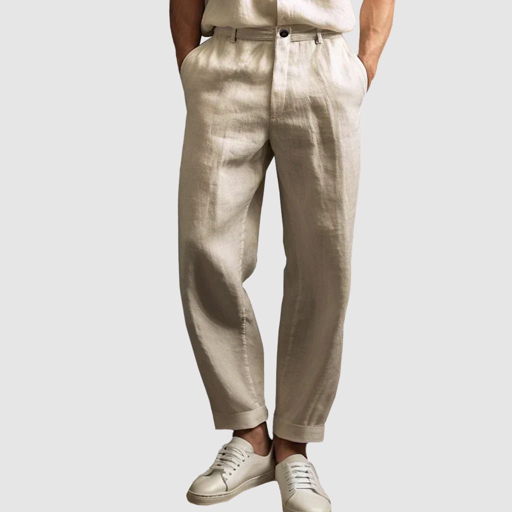 Savannah Breeze khaki linen straight cut pants with tailored fit, shown on a person standing with cuffed bottoms and white sneakers, emphasizing the tailored fit and breathable fabric.