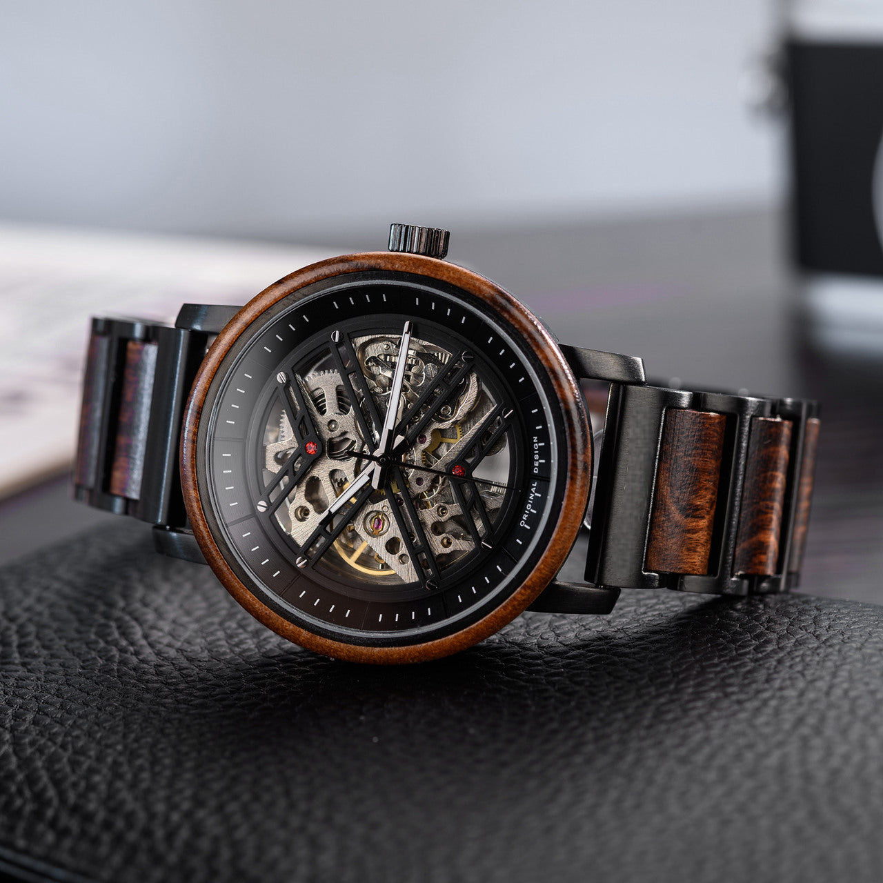 Terra Brown men's wooden watch natural finish, angled view highlighting skeleton dial natural wooden strap dark background.