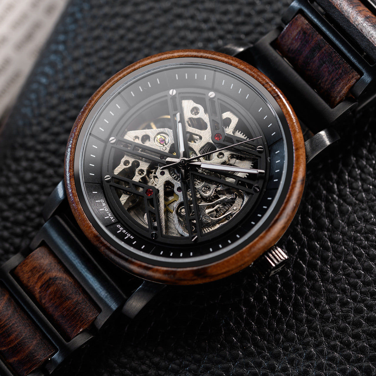 Terra Brown men's wooden watch natural finish, close-up top-down view skeleton dial revealing intricate movement wooden bezel.