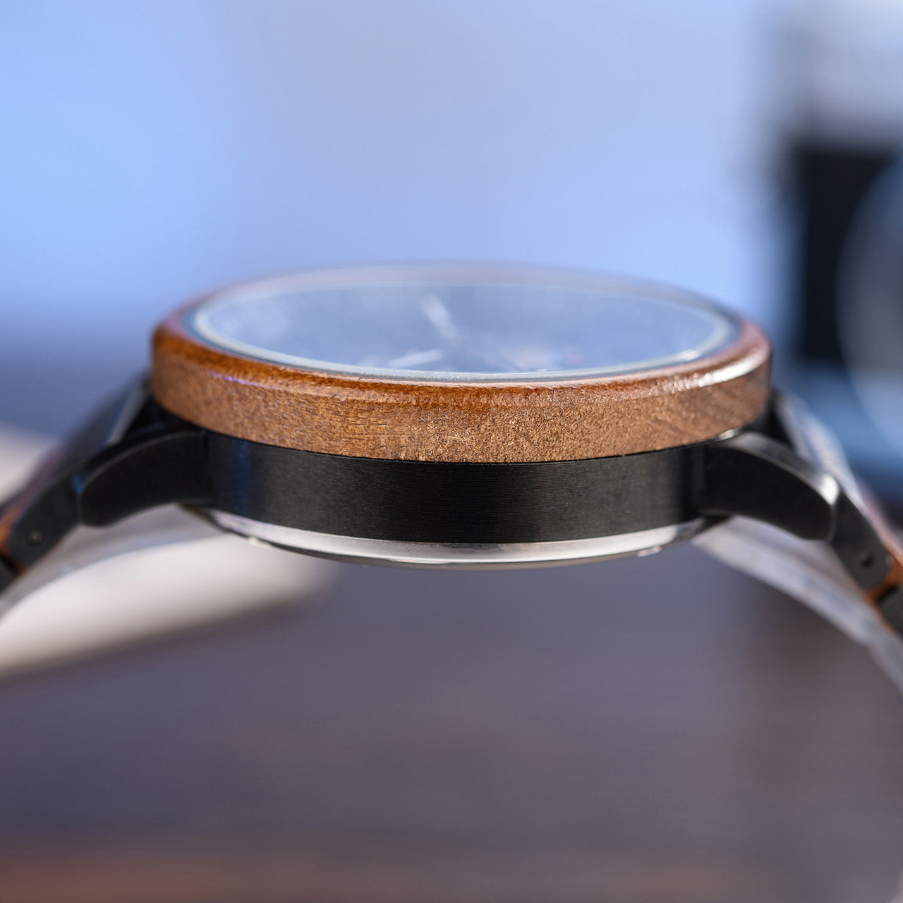 Terra Brown men's wooden watch with natural finish, side profile view highlighting the thickness of the wooden bezel and watch case.