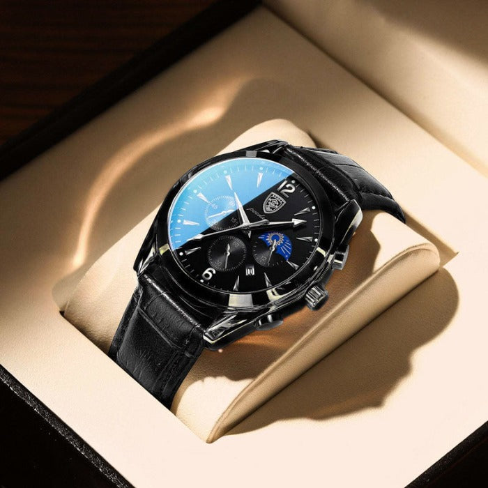 Aventadori men's watch in rose gold with a black leather strap, featuring a black case, black chronograph dial with blue accents, resting in an open watch box.