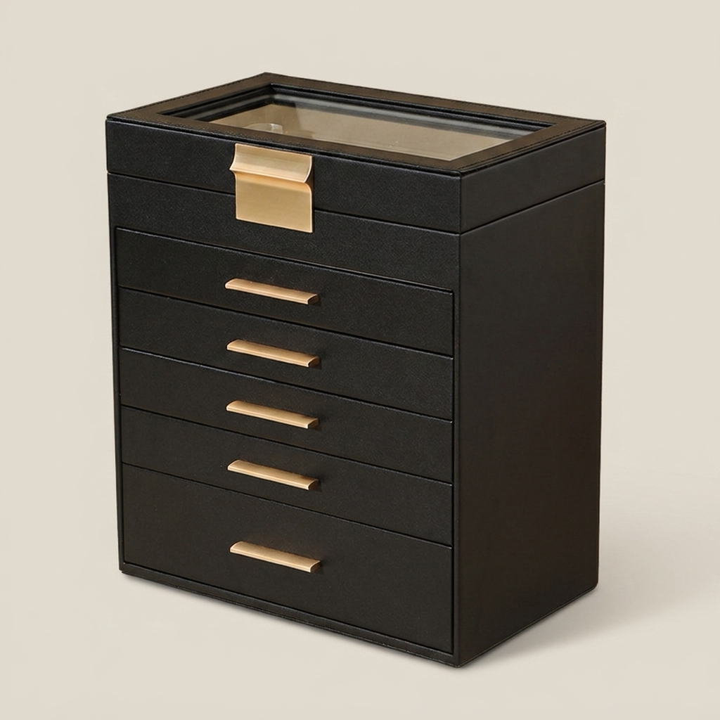 Black PU leather sliding drawer jewelry box at three-quarter angle showing black glass top, wooden handle, and brass accent