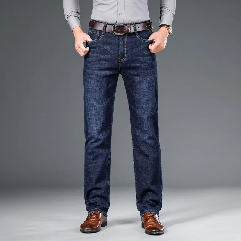 Front view of a man wearing Cityscape Trousers in dark blue, highlighting the classic fit and premium cotton material.