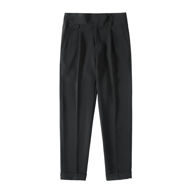 Men's Elysian high-waisted slim-fit trousers in black premium fabric with a tailored finish, shown in a flat lay front view with cuffed hems and button details.