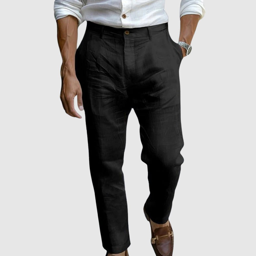 Elysium Weave Luxe Linen Pants in Black, shown on a man wearing brown loafers. Soft texture and elegant finish for versatile fashion.