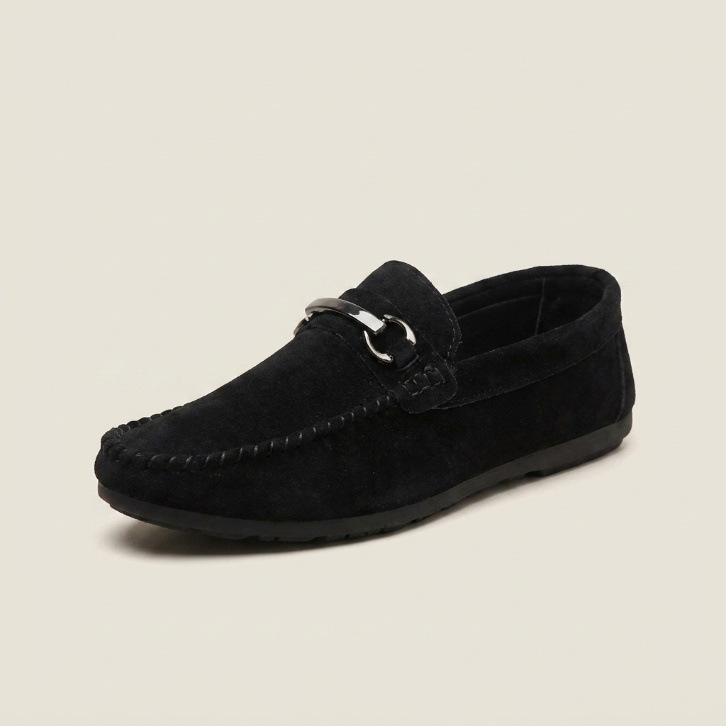 Black bucket loafer shown front view with open toe, buckle closure, flat heel, and low-cut collar