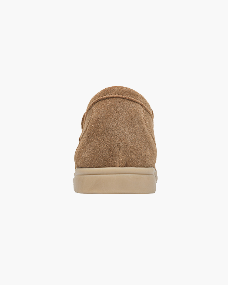 Back view of a single Heritage Luxe men's caramel suede loafer with classic stitching, on a white background.