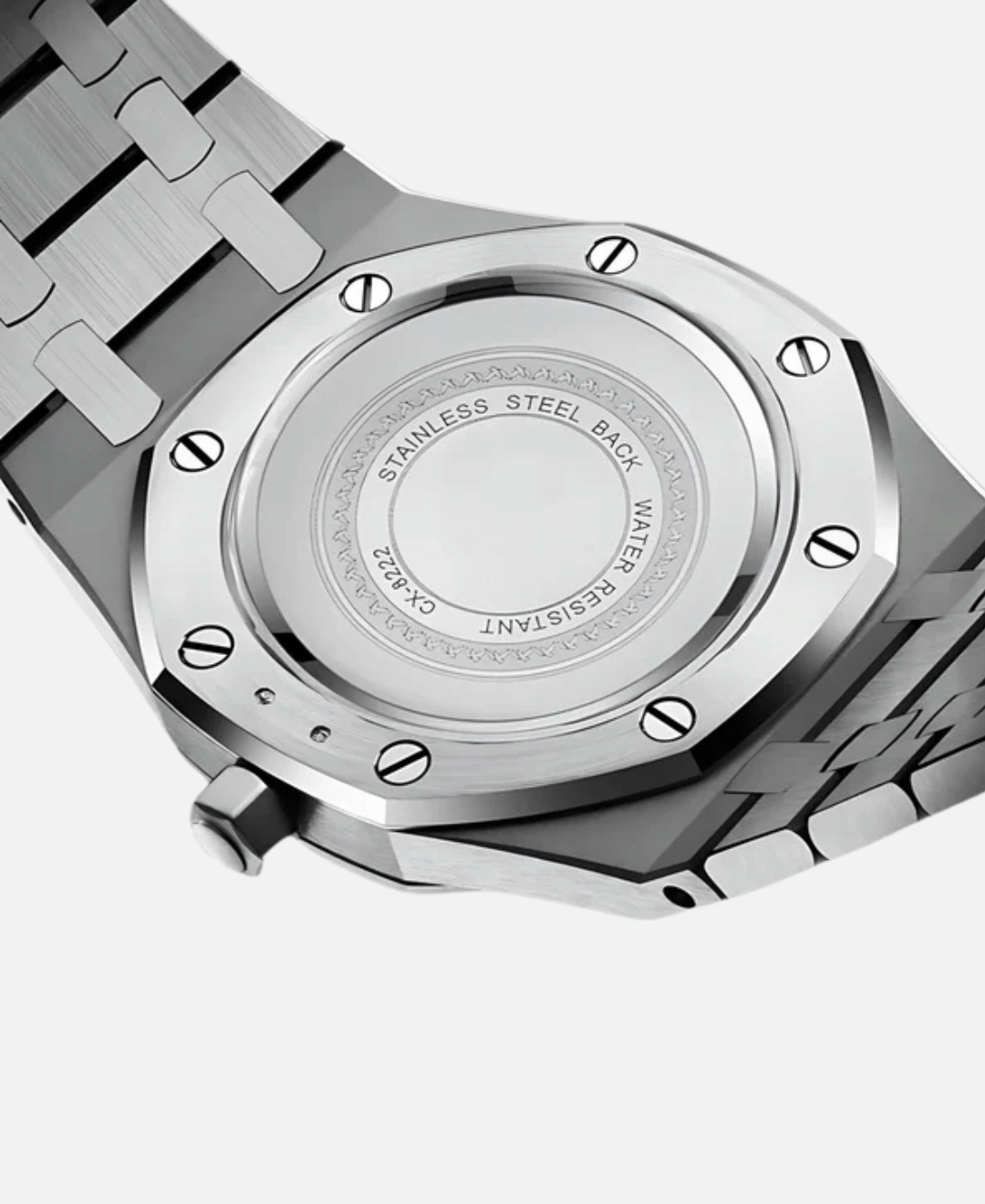 Kings Oak Oak Wood Furniture Handcrafted Finish: Close-up back view of a silver stainless steel watch, highlighting engraved details on the case back.