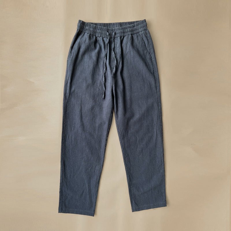 Luxe Retreat Comfy Linen Pants with Relaxed Fit in blue, laid flat on a neutral background, showcasing the relaxed fit, elastic waistband, and drawstring. Perfect for breathable, lightweight comfort.