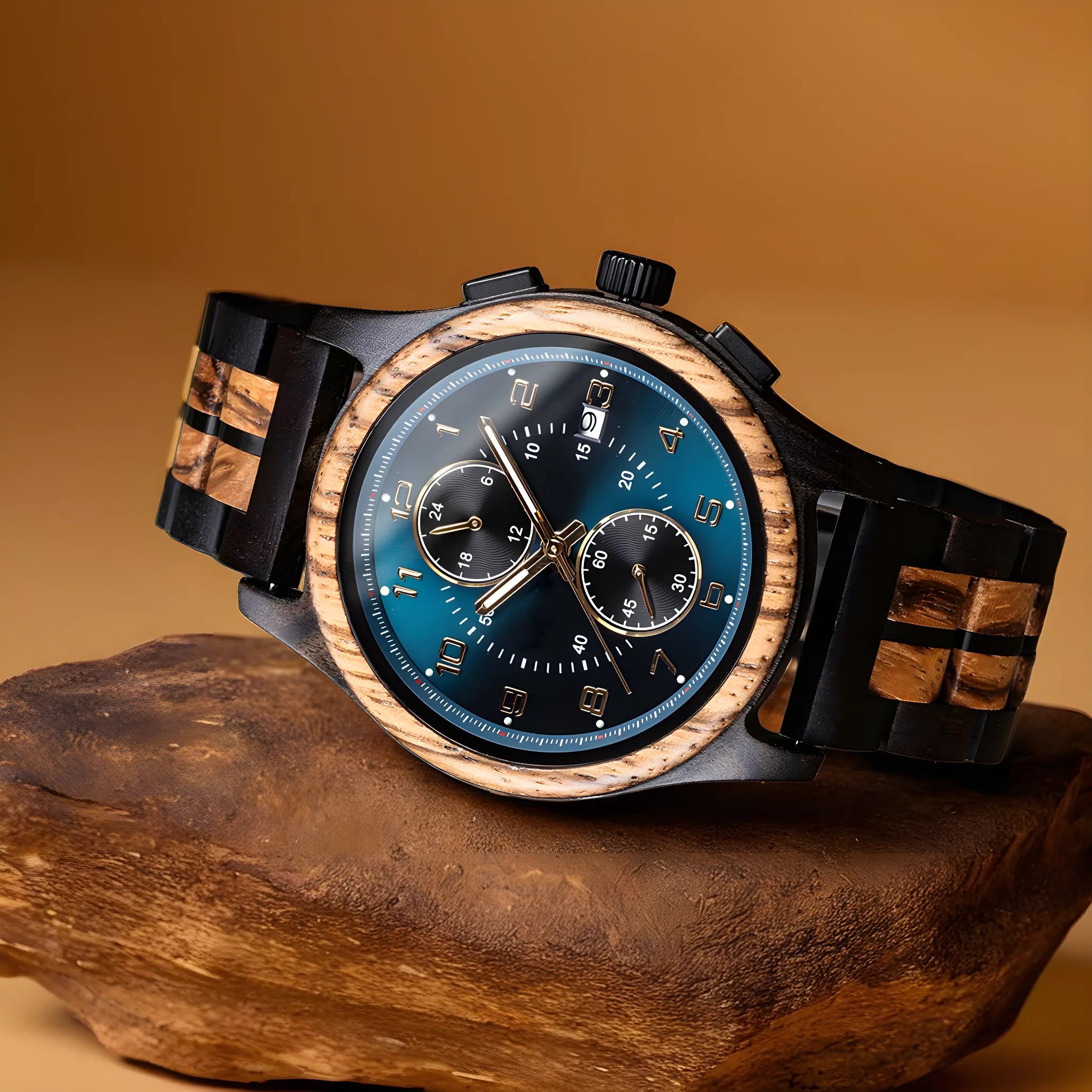 Majestic Noir men's wooden watch with stainless steel accents, featuring a blue dial and chronograph subdials, displayed on a natural wood surface.