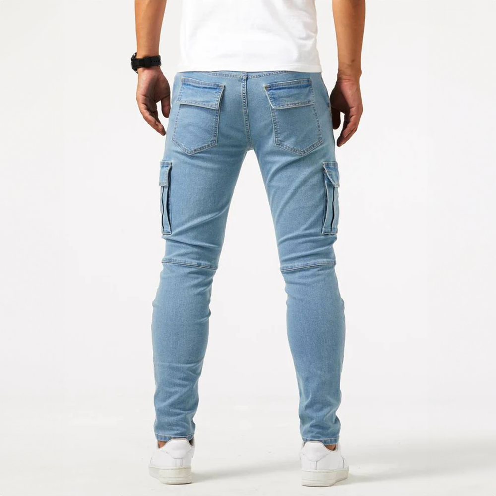 Metro Blue Cargo Trousers. Full back view of a male model wearing light blue denim cargo pants, showing rear pockets and leg details.