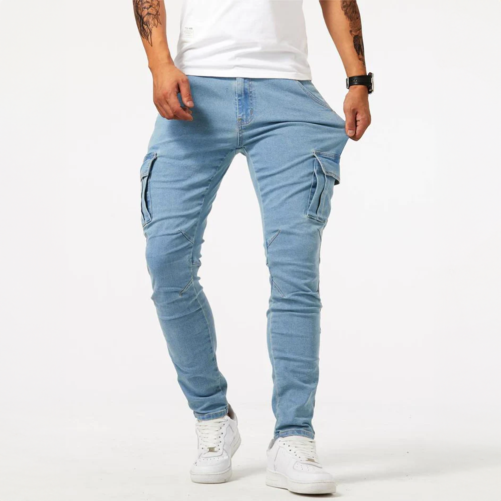Metro Blue Cargo Trousers. Full front view of a male model wearing light blue denim cargo pants, showcasing the fit and adjustable waistband.