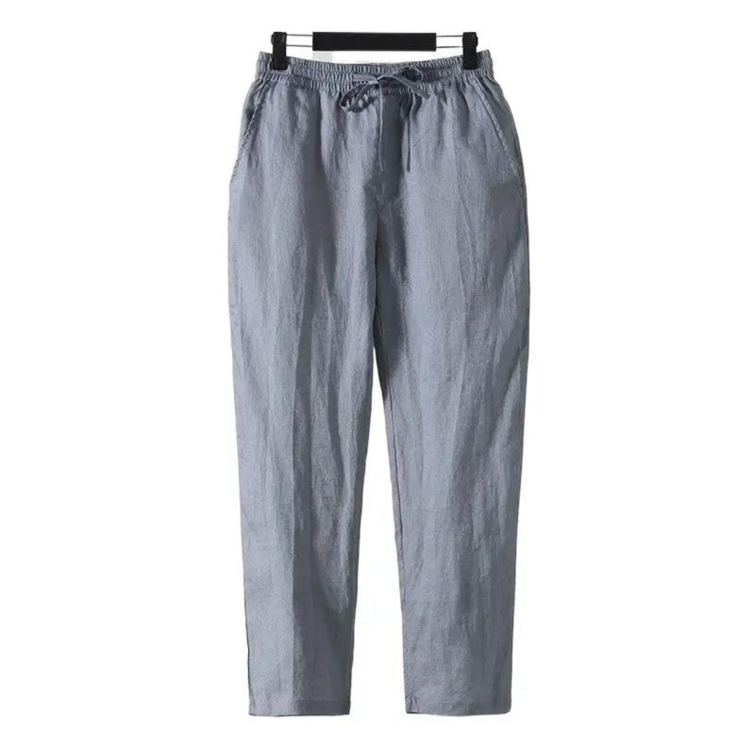 Sahara Whisper blue linen pants, straight fit, soft touch finish, hanging front view with drawstring waist. Ideal for comfortable, relaxed casual wear.