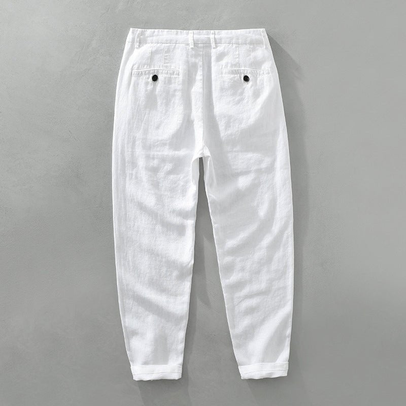 Savanna Breeze white linen pants in lightweave fabric, tailored fit, shown from the back view laid flat, highlighting the two back pockets black buttons breathable texture.