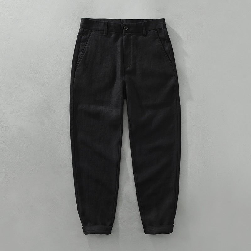 Savanna Breeze black linen pants in lightweave fabric with tailored fit, shown from the front with cuffed hems.