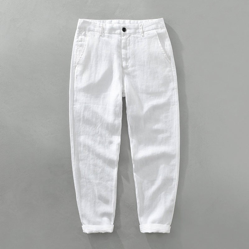 Savanna Breeze white linen pants in lightweave fabric with tailored fit, shown from the front with cuffed hems.
