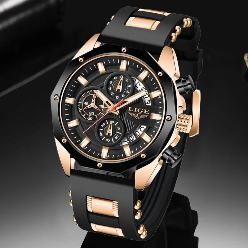 Skyline Aviator men's quartz watch with analog display and luminous hands, featuring a black dial, gold-tone case, and black silicone strap with gold accents, displayed on a dark reflective surface.