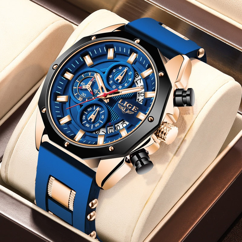 Skyline Aviator men's quartz watch with analog display and luminous hands, featuring a blue dial, gold-tone case, and blue silicone strap, presented on a white watch stand.
