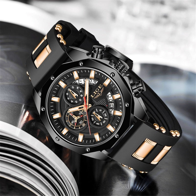 Skyline Aviator men's quartz watch with analog display, black dial, black case, black silicone strap with gold accents, luminous hands, chronograph, and date display.