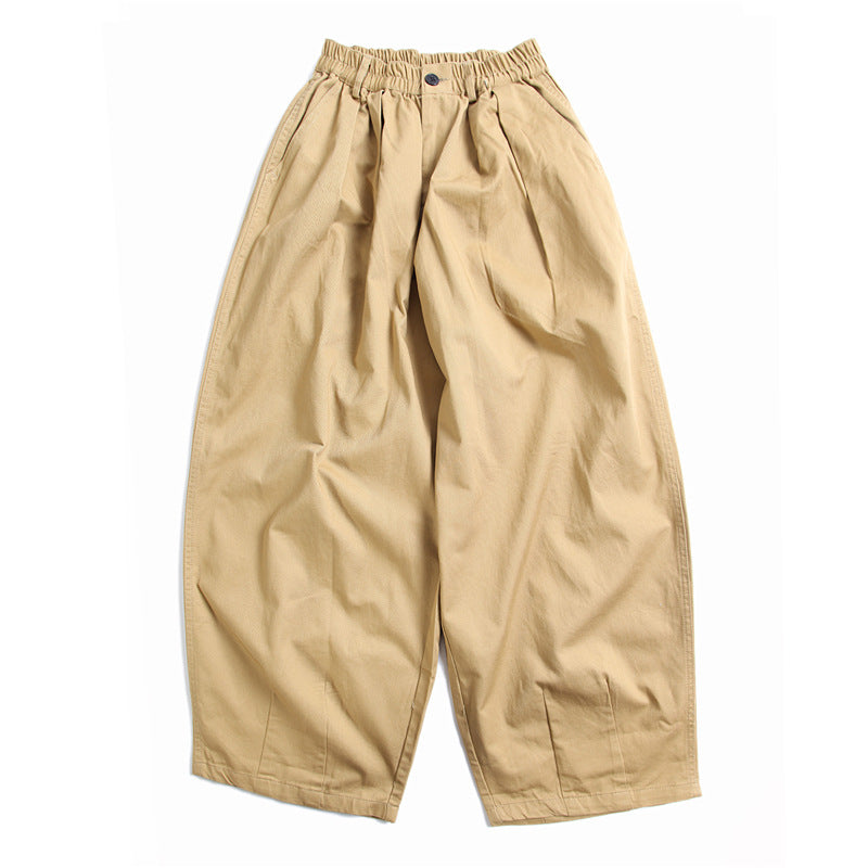 Urban Luxe men's wide-leg casual pants in khaki, laid flat showing the front view with an elastic waistband and button closure. Soft fabric, relaxed fit.