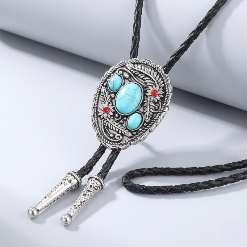 Bolo tie with turquoise stones and silver accents on a white background